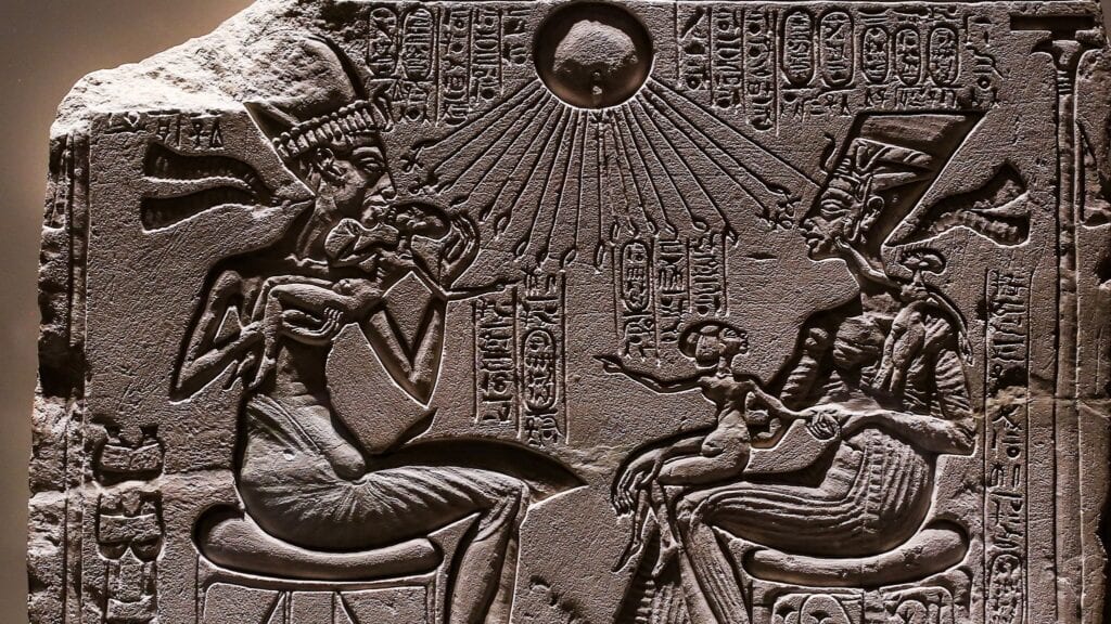 Relief-depicting-Akhenaten-and-Nefertiti-with-three-of-their-daughters-under-the-rays-of-Aton-the-golden-lost-city